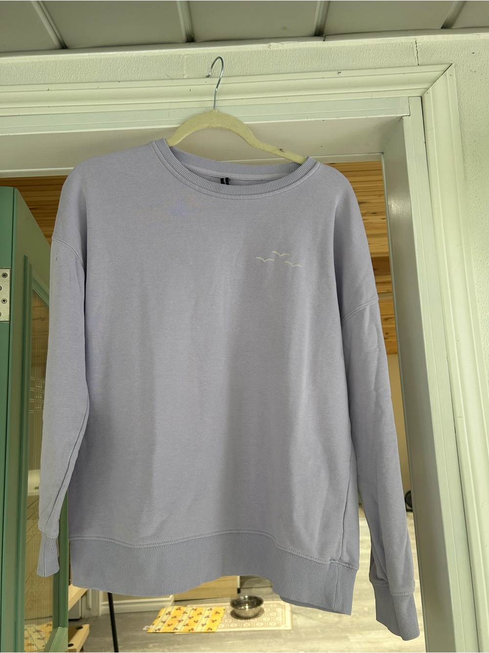 Relaxed Lavender Crewneck Sweatshirt with Subtle Bird Embroidery